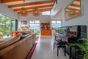 Huis Willers - First Floor Open Plan Living Space looking onto Covered Patio