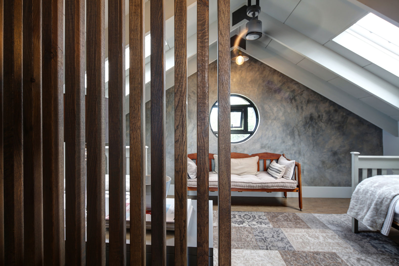 Bathroom Wooden Privacy Screen and view of guest suite and porthole window