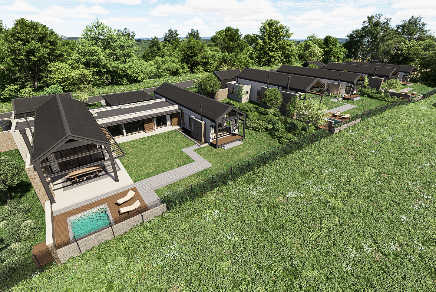 Birdseye view from the east of the development, with steel portal frame gable ends and courtyard gardens